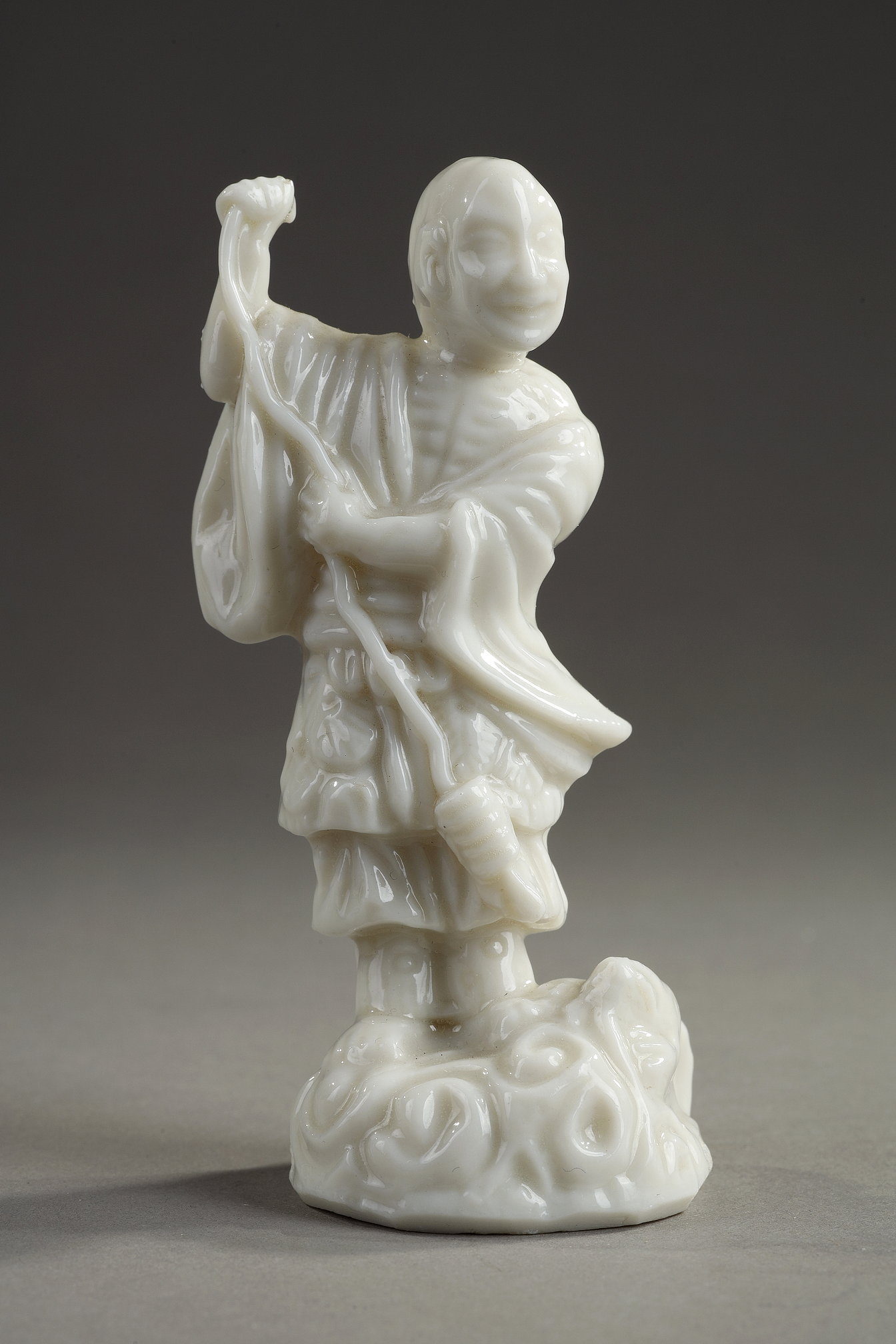 Porcelain figure  " blanc de Chine" porcelain   representing liu Hai  - (divinity of wealth ) Dehua’s kilns                   Fujian province - Kangxi period 1662/1722   H 9,8cm